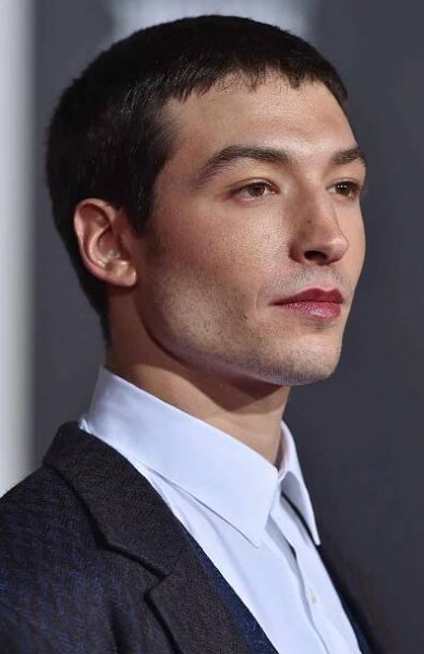 Ezra Miller arrives at the premiere of Warner Bros. Pictures' 'Justice League'