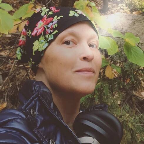 A selfie of Nicki Aycox wearing a headscarf.