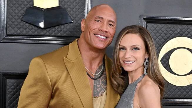 Dwayne Johnson holding wife Lauren Hashian