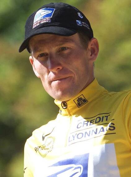 Lance Armstrong on the podium on the Champs Elysees in Paris on July 25, 1999.