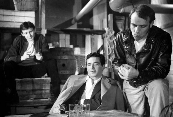 Black and white photo of Jack Betts, Peter Falk, and Ron Hartmann in a scene from 'The Bloody Brood' (1959).