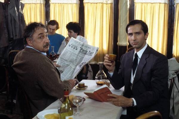 Thierry Lhermitte et Philippe Noiret dans "Les Ripoux" de Claude Zidi en mars 1984 sur le tournage