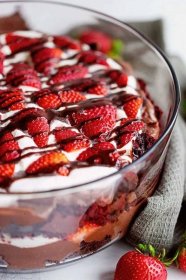Chocolate strawberry trifle in a trifle bowl.