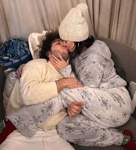 Benny Blanco kissing Selena Gomez
