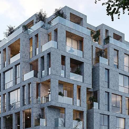 an apartment building with balconies and plants on the windows