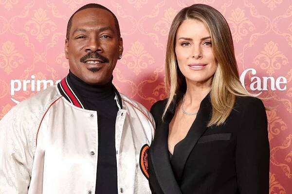 Eddie Murphy and Fiancée Paige Butcher Cozy Up at Candy Cane Lane Premiere in Los Angeles
