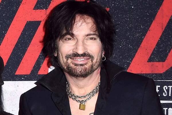 HOLLYWOOD, CALIFORNIA - MARCH 18: (L-R) Vince Neil, Nikki Sixx, Mick Mars and Tommy Lee of Mötley Crüe arrives at the Premiere Of Netflix's 