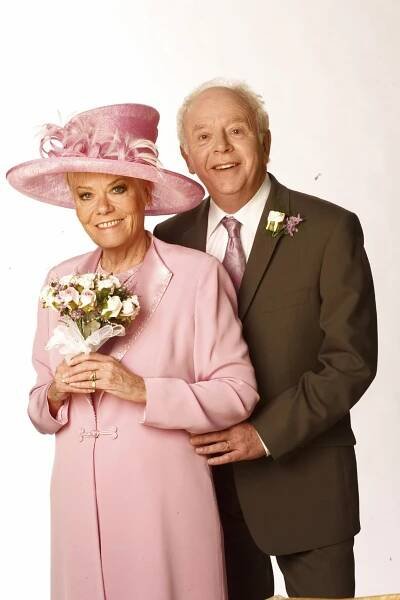 Photo of Wendy Richard and Ray Brooks in wedding attire.