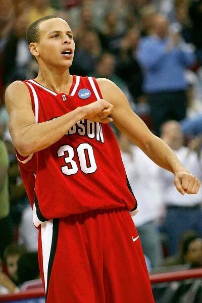 Stephen Curry #30 of the Davidson Wildcats reacts after scoring a three-point basket against the Gonzaga Bulldogs during the 1st round of the 2008 NCAA Men's Basketball Tournament on March 21, 2008 at RBC Center in Raleigh, North Carolina. Davidson defeated Gonzaga 82-76. 