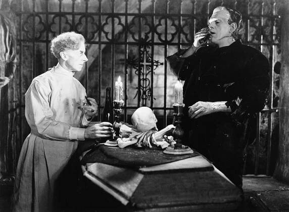 Dr. Pretorius (Ernest Thesiger) and the Monster (Boris Karloff) 