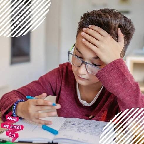 A child is focusing on work and having a stress free school day