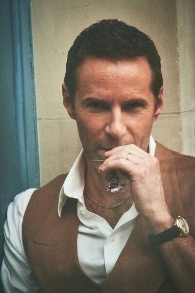Vest, shirt by GIORGIO ARMANI.