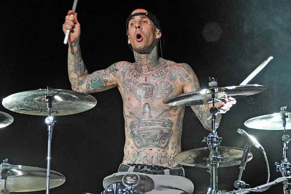 Travis Barker Defends His 'Badass' Collection of Tattoos from Online Haters