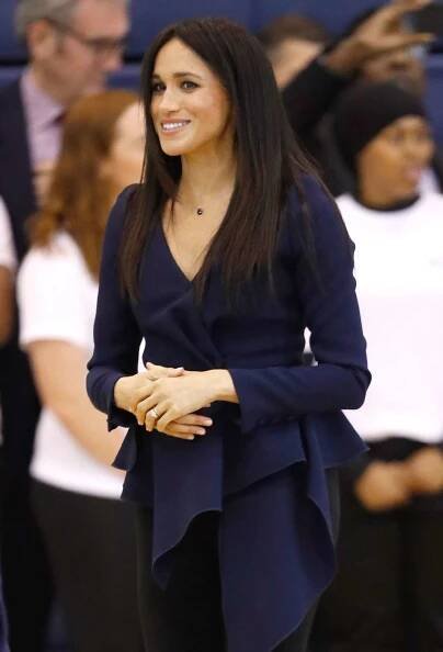 This Is the Secret Behind Meghan Markle's Super Straight Hair Today