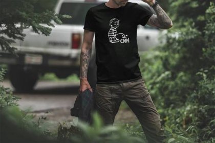 t-shirt-mockup-of-a-tattooed-man-in-the-woods-1839-el1.png
