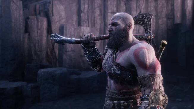 Kratos carries an axe out of Valhalla in God of War Ragnarok Valhalla