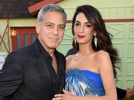 George Clooney and his wife Amal Clooney arrive at the premiere of Paramount Pictures' 