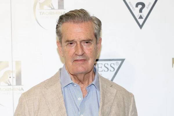 Image may contain Rupert Everett Face Head Person Photography Portrait Adult Blonde Hair and Senior Citizen