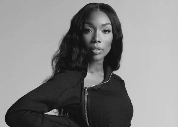 A portrait of music icon Brandy Norwood who is set to publish her first memoir in fall 2025