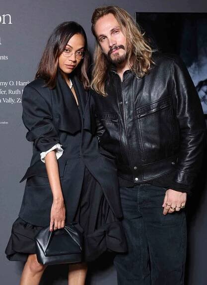 Zoe Saldana and Marco Perego attends a photocall for "An Invitation To Dream" during the Milan Design Week 2024