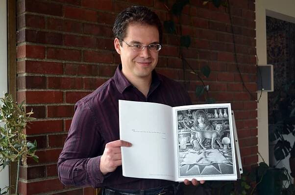 Christopher Paolini Holds His Shaded Version of Angela the Herbalist, #ColorEragon