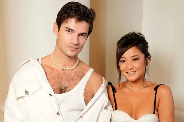 Ashley Park and Paul Forman at Giambattista Valli RTW Fall 2024 as part of Paris Ready to Wear Fashion Week held at Les Invalides on March 1, 2024 