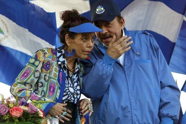 FILE - Nicaragua's President Daniel Ortega and his wife, Vice President Rosario Murillo, lead a rally in Managua, Nicaragua. Nicaragua’s government on Wednesday, Aug. 23, 2023, declared the Jesuit religious order illegal and ordered the confiscation of all its property. (AP Photo/Alfredo Zuniga, File)