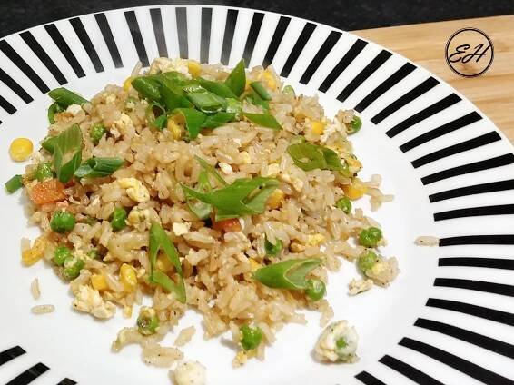 Fried rice with eggs, peas and sweet corn