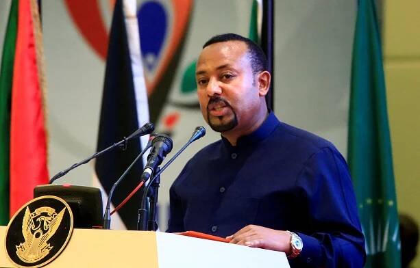 FILE PHOTO: Ethiopia's Prime Minister Abiy Ahmed addresses delegates during the signing of the Sudan's power sharing deal, in Khartoum