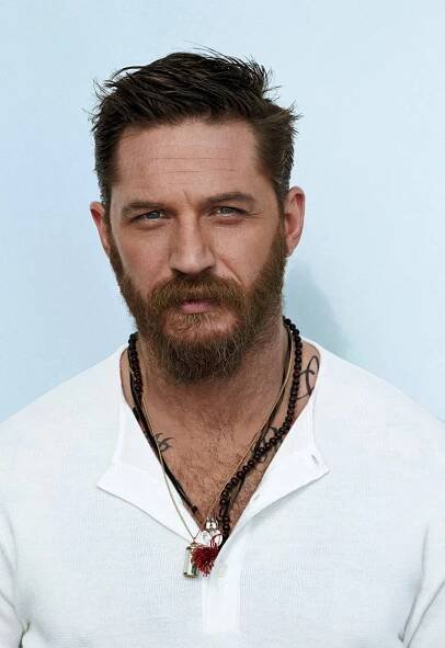 Image may contain Tom Hardy Jewelry Necklace Accessories Accessory Face Human Person Beard and Man