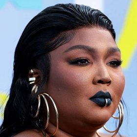 Lizzo Got Candid About Losing Weight Without “Trying to Escape Fatness” — See Video