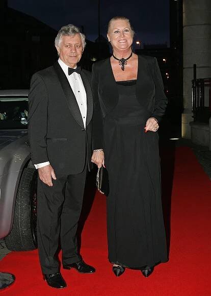 Kim Woodburn and her husband arriving at an awards ceremony.
