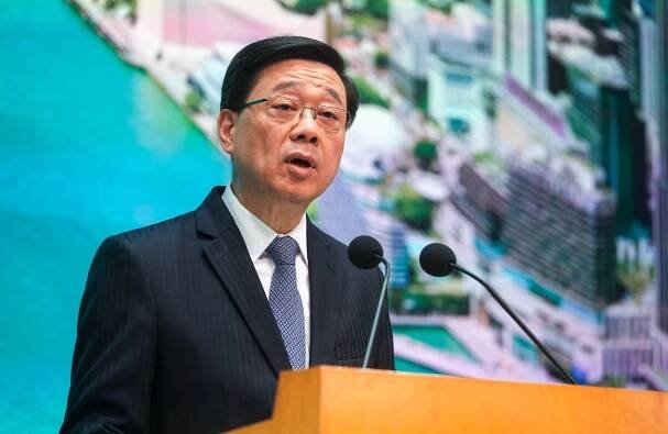 Chief Executive John Lee Ka-chiu speaks to the media at the government offices in Tamar on April 8. Lee slammed the United States for undermining global trade and bringing risks and uncertainties to the world through its “reckless imposition of tariffs”. Photo: Sun Yeung