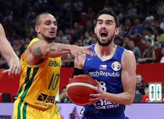 Svátek s USA, kosení favoritů, boj s titány. Připomeňte si basketbalovou senzaci