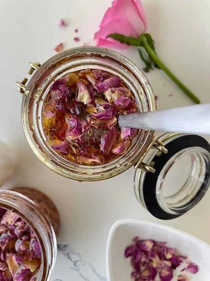 stirring the rose honey