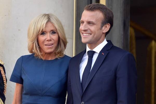Brigitte Macron, left, and Emmanuel Macron