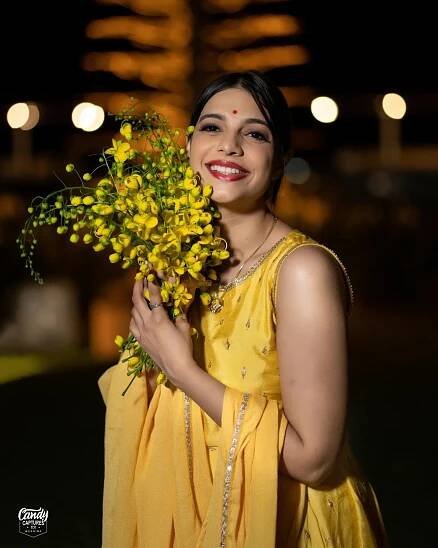 Santhi Mayadevi: 10 Dazzling Photos That Highlight Their Unique Style and Personality 17