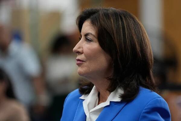 A side profile of Gov. Kathy Hochul, the background blurred behind her.