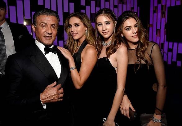 Sylvester Stallone, Scarlet Rose Stallone, Sophia Rose Stallone and Sistine Rose Stallone attend The 2017 InStyle and Warner Bros. 73rd Annual Golden Globe Awards Post-Party