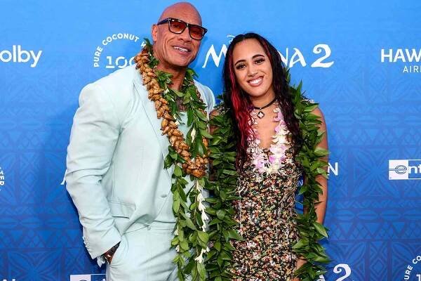 Dwayne Johnson and Simone Garcia Johnson attend the world premiere of 'Moana 2'
