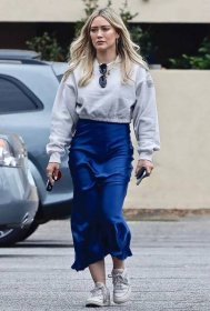 *EXCLUSIVE* Hilary Duff brings out satin blue skirt and cropped sweater for breakfast at Joan's On Third