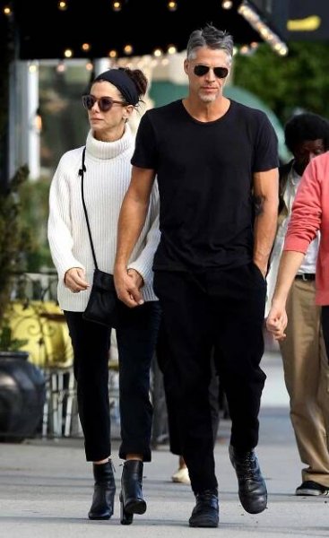 Sandra Bullock and new love Bryan Randall hold hands for a casual coffee outing at Andante Coffee Roaster. The loved up couple were spotted inside showing a lot of affection toward each other during their time inside. An eyewitness said Bryan had his arm around Sandra as they waited for their coffee orders to be made. The hot new couple walked out locking their hands again for the short stroll to their car to head home