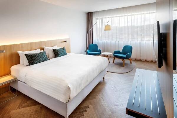 Postel nebo postele na pokoji v ubytování Courtyard by Marriott Brno