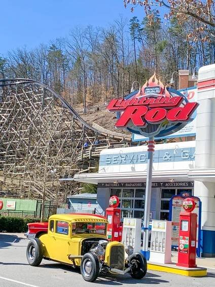 dollywood rollercoaster lightning rod with yellow car and old gas pumps