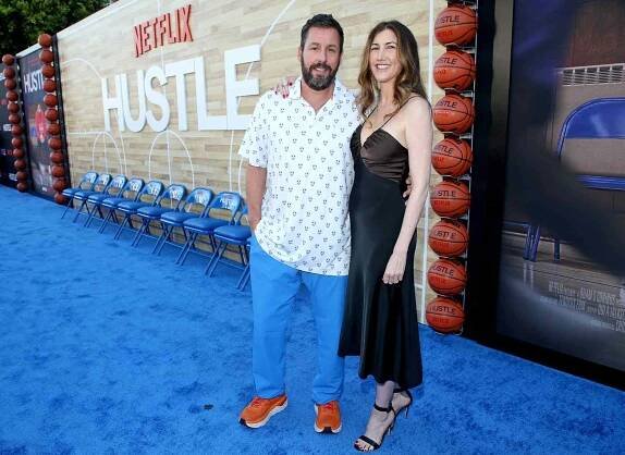 Adam Sandler and Jackie Sandler attend the Netflix World Premiere of "Hustle" at Regency Village Theatre on June 01, 2022 in Los Angeles, California.