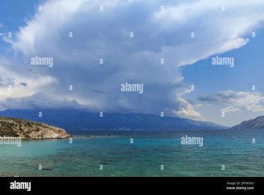 Stony wild Kastelina beach on the island of Rab in Croatia and wild nature azure Adriatic Sea Stock Photo