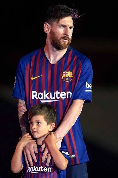 Lionel Messi of FC Barcelona looks on with his son Thiago Messi at the end the La Liga match between Barcelona and Real Sociedad at Camp Nou on May 20, 2018 in Barcelona, Spain. 