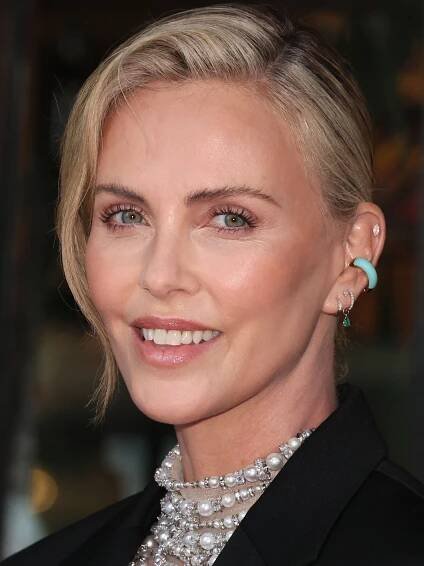 OMG, Look at Charlize Theron’s Teensy-Weensy Bubble Ponytail — See Photos