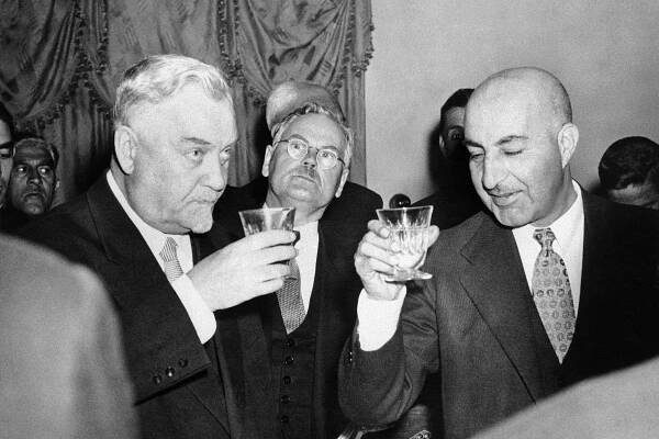 Sardar Mohammed Daoud Khan, then prime minister of Afghanistan (far right), seen with Soviet Minister of Defense Marshal Nikolai Bulganin in Kabul on December 16, 1955. These Soviet ties brought a slow escalation of conflict with the US in the Cold War.