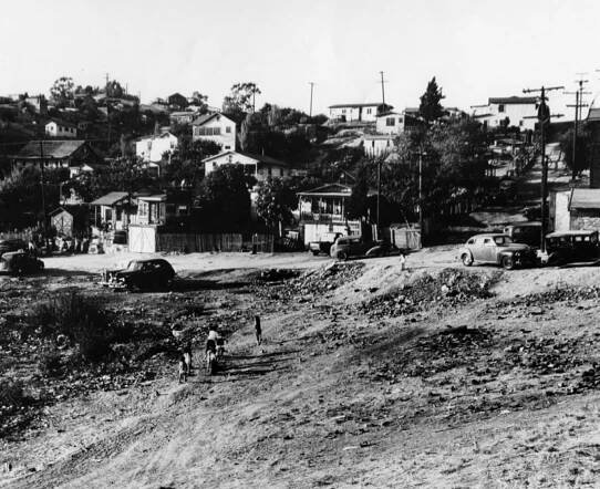 1948: "Panoramic view of the housing in Chavez Ravine. Mostly Mexican American families lived in this area. Children are at play in the foreground." Courtesy of the Los Angeles Public Library